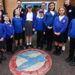 Senior Leadership Team members Danielle Awty, Lee Anderson, Edward Gillespie and Hanna Evans pictured with pupils at Reginald Mitchell Primary School (Image: Pete Stonier / Stoke Sentinel)