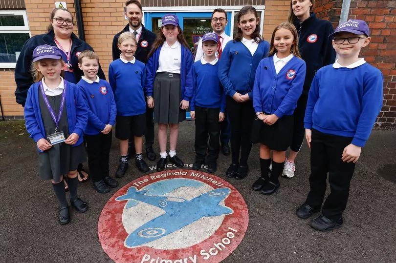 Senior Leadership Team members Danielle Awty, Lee Anderson, Edward Gillespie and Hanna Evans pictured with pupils at Reginald Mitchell Primary School (Image: Pete Stonier / Stoke Sentinel)